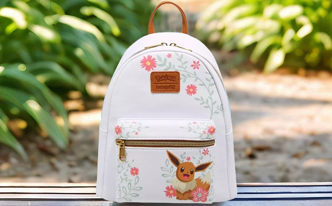 Loungefly Pokemon Eevee Spring Flowers Mini Backpack on a Bench Loungefly Pokemon Eevee Spring Flowers Mini Backpack on a Bench