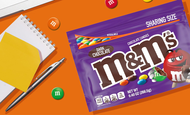 MMS Dark Chocolate Candy Sharing Size Resealable Candy Bag on an Office Table