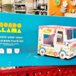 Mondo Llama Ice Cream Truck Art Kit on top of Target Shopping Cart