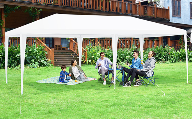People Sitting Under the Heavy-Duty 10 x 20-Foot Canopy Tent People Sitting Under the Heavy-Duty 10 x 20-Foot Canopy Tent
