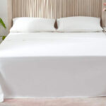 Py Home Sports Queen Sheet Set on the Bed in White Color