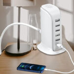 Upoy Charging Station with a Mobile Phone Plugged in