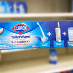 a Hand Holding Clorox ToiletWand System