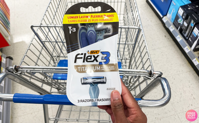 a Person Holding BIC Mens Flex 3 Disposable Razors 3 Pack in front of Walgreens Cart