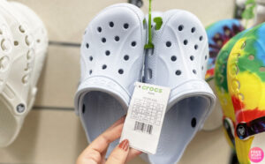 A Person Holding a Tag of Crocs Baya Clogs