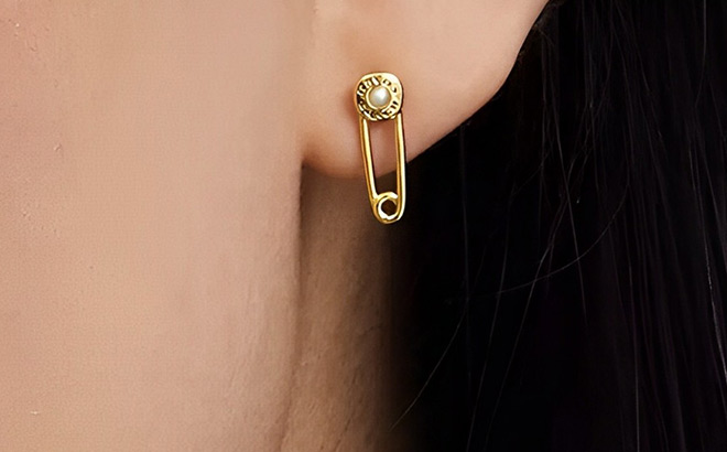 A Person Wearing Coach Outlet Safety Pin Stud Earrings A Person Wearing Coach Outlet Safety Pin Stud Earrings