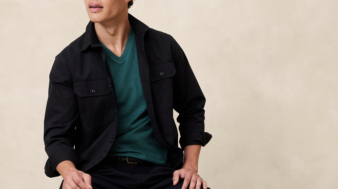 A Person Wearing a Banana Republic Premium Wash T Shirt in Deep Sea Teal Color A Person Wearing a Banana Republic Premium Wash T Shirt in Deep Sea Teal Color