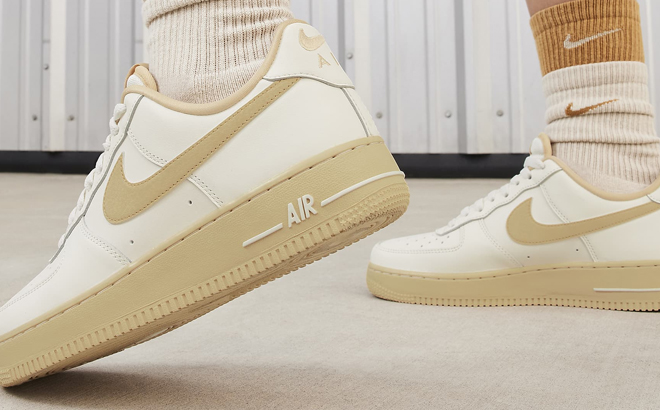 A Woman Wearing Nike Air Force 1 ’07 Shoes