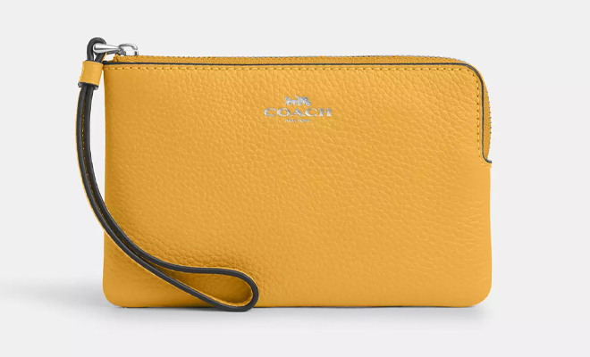 Coach Outlet Corner Zip Wristlet in the Color Silver Honeycomb