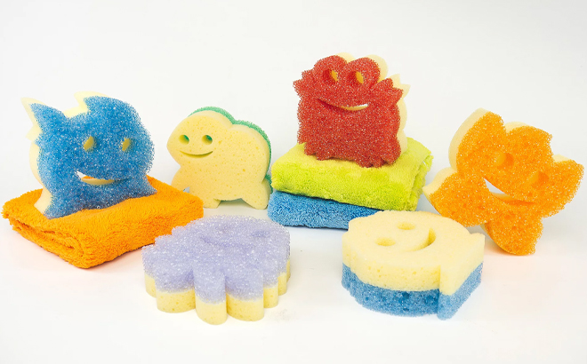 Scrub Mommy Set of 6 Summer Shape Sponge Set with 3 Towels on a Gray Background Scrub Mommy Set of 6 Summer Shape Sponge Set with 3 Towels on a Gray Background