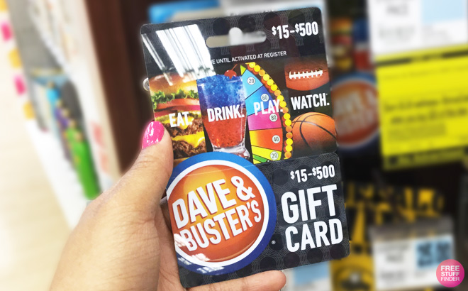 a Person Holding Dave Busters Gift Card a Person Holding Dave Busters Gift Card