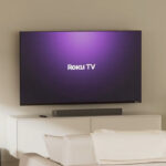 onn 65 Inch 4K UHD Smart Roku TV in a Living Room