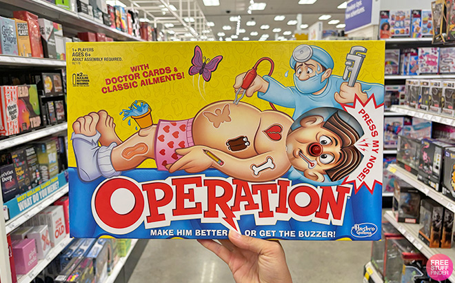 A Hand Holding Operation Board Game A Hand Holding Operation Board Game