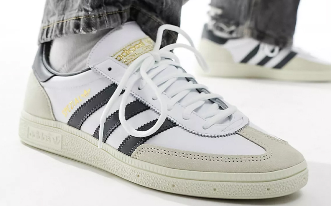 A Man Wearing Adidas Originals Handball Spezial Sneakers A Man Wearing Adidas Originals Handball Spezial Sneakers