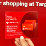 A Person Holding Target Circle Card