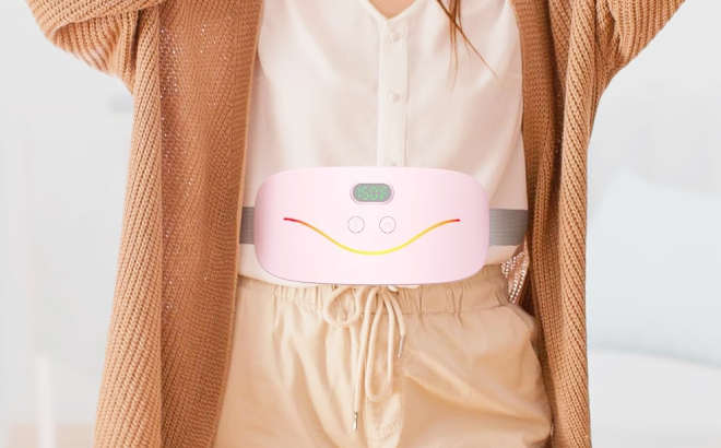 A Person Using a Portable Cordless Heating Pad