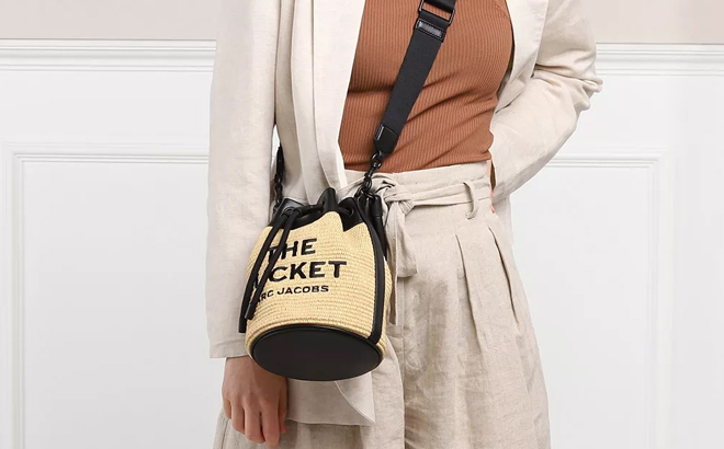 A Woman Wearing Marc Jacobs The Woven Bucket Bag A Woman Wearing Marc Jacobs The Woven Bucket Bag