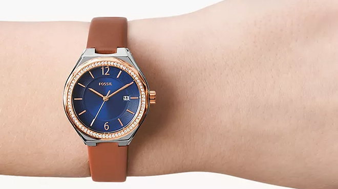 A person wearing a Fossil Eevie Three Hand Date Leather Watc A person wearing a Fossil Eevie Three Hand Date Leather Watc