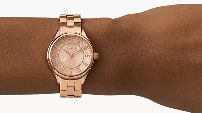 A person wearing a Fossil Modern Sophisticate Stainless Steel Watch A person wearing a Fossil Modern Sophisticate Stainless Steel Watch