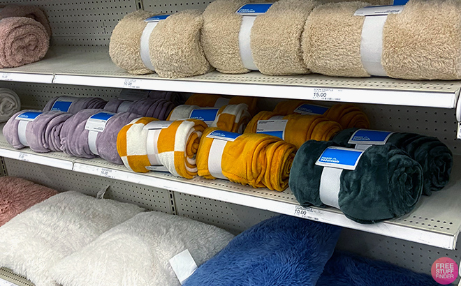 Room Essentials Plush Throw Blankets in shelf Room Essentials Plush Throw Blankets in shelf
