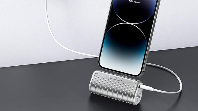 Vrurc Mini Portable Charger Charging a Mobile Phone