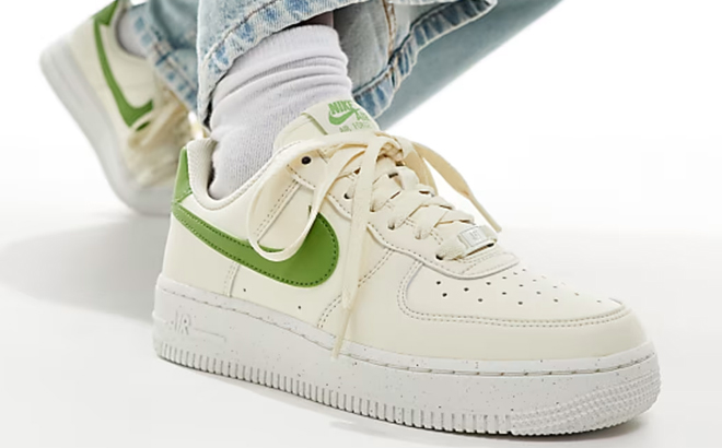 A Man Wearing Nike Air Force 1 Sneakers A Man Wearing Nike Air Force 1 Sneakers
