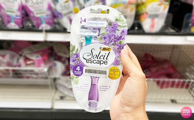 A Person Holding BIC Soleil Escape Womens Disposable Razors A Person Holding BIC Soleil Escape Womens Disposable Razors