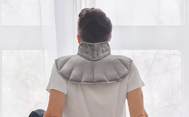 A Person Using the Altavida Weighted Neck Wrap A Person Using the Altavida Weighted Neck Wrap
