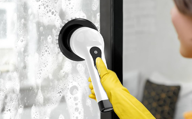 A Person using an Electric Spin Scrubber A Person using an Electric Spin Scrubber
