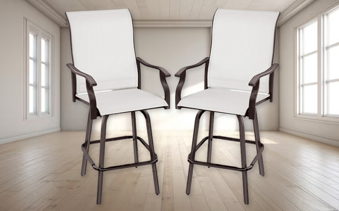 A Set of Two Swivel Barstools with 360 Rotation in a Empty Room A Set of Two Swivel Barstools with 360 Rotation in a Empty Room
