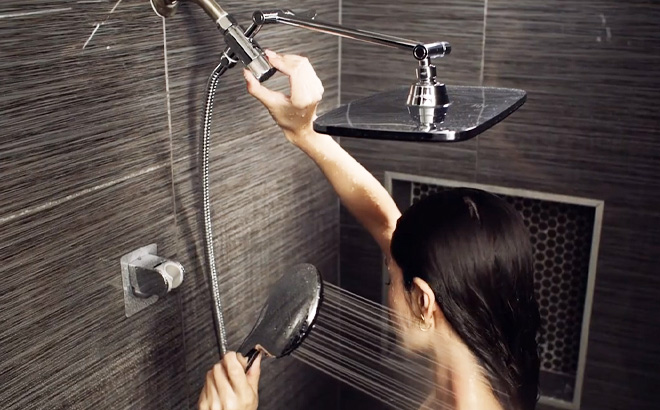 a Person Using High Pressure Rain Shower Head Combo with Adjustable Extension Arm a Person Using High Pressure Rain Shower Head Combo with Adjustable Extension Arm