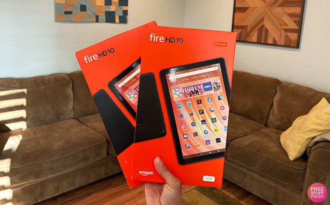 A Person Holding Amazon Fire Tablet Bundle A Person Holding Amazon Fire Tablet Bundle