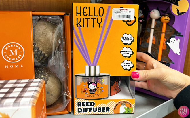 A person hilding a Hello Kitty Reed Diffuser A person hilding a Hello Kitty Reed Diffuser