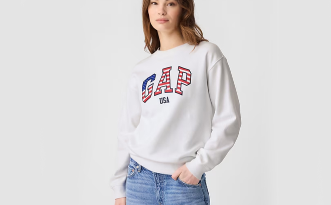 A person wearing a GAP Factory Logo Sweatshirt