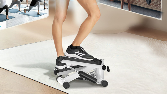 A Person Using Mini Steppers for Exercise A Person Using Mini Steppers for Exercise