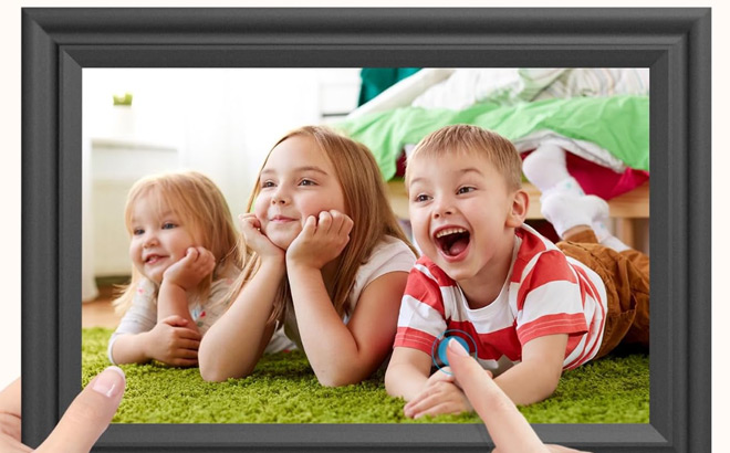 A Person Using a Digital Picture Frame Touch Display A Person Using a Digital Picture Frame Touch Display