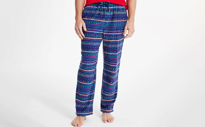 A Person Wearing Club Room Mens Fleece Pajama Pants A Person Wearing Club Room Mens Fleece Pajama Pants