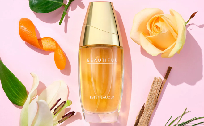 Estee Lauder Beautiful Eau de Parfum Spray Alonside Flowers Estee Lauder Beautiful Eau de Parfum Spray Alonside Flowers