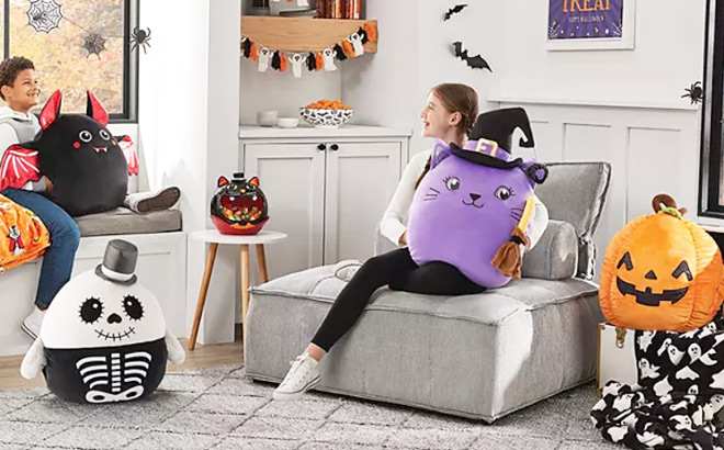Kids Playing with Halloween Secret Pocket Squishy Plushes Kids Playing with Halloween Secret Pocket Squishy Plushes