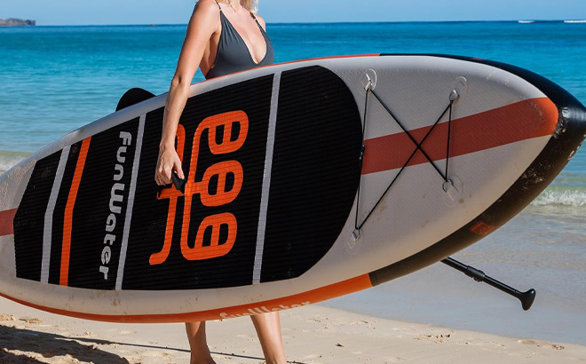A Person holding FunWater Inflatable Paddle Board
