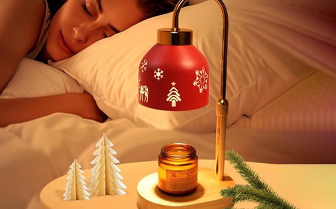 Christmas Candle Warmer Lamp on a Night Stand Christmas Candle Warmer Lamp on a Night Stand