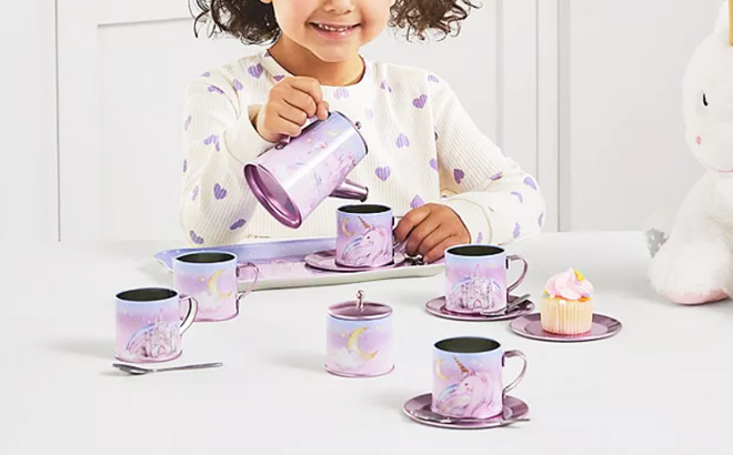 A Little Girl Playing with Members Mark Tea Party Set