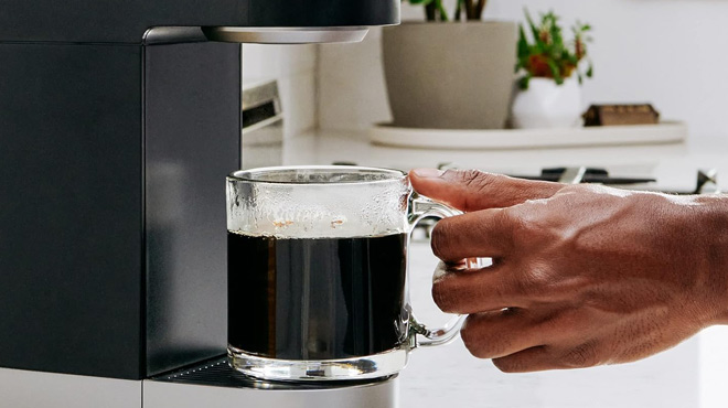 A Person Making Coffee A Person Making Coffee