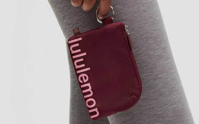 A Woman Holding Lululemon Clippable Card Pouch A Woman Holding Lululemon Clippable Card Pouch