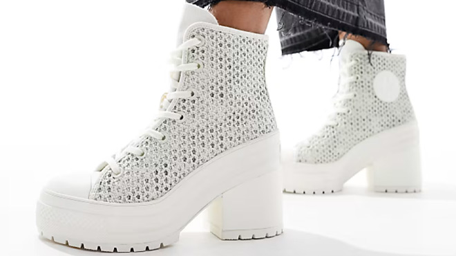 A Woman Wearing Converse Chuck 70 De Luxe Heeled Sneakers A Woman Wearing Converse Chuck 70 De Luxe Heeled Sneakers