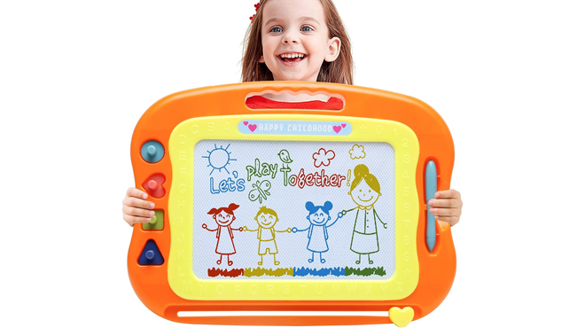 A little girl holding a Bablocvid Magnetic Drawing Board A little girl holding a Bablocvid Magnetic Drawing Board