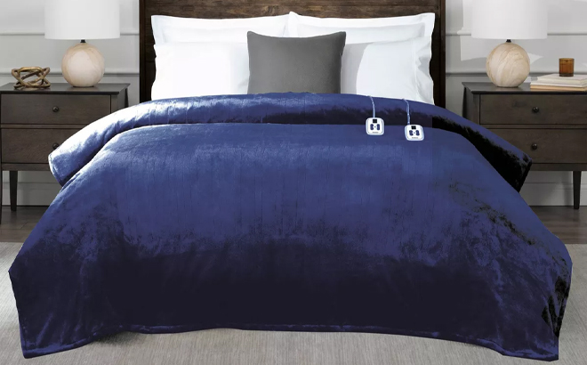 Brookstone Heated Blanket on a Bed in Navy Brookstone Heated Blanket on a Bed in Navy