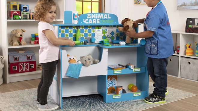 Kids playing with Melissa Doug Animal Care Veterinarian and Groomer Wooden Activity Center Kids playing with Melissa Doug Animal Care Veterinarian and Groomer Wooden Activity Center