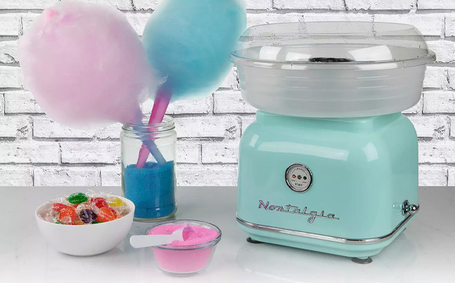 Nostalgia Electrics Classic Retro Hard Sugar Free Candy Cotton Candy Maker on the Table Nostalgia Electrics Classic Retro Hard Sugar Free Candy Cotton Candy Maker on the Table