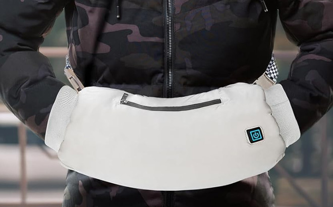 a Person Using Heated Hand Warmer Pouch